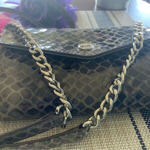 Michael Kors snake skin leather crossbody purse in gray.